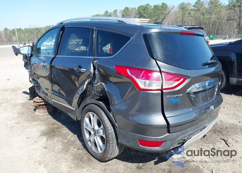 2015 Ford Escape Titanium z USA, uszkodzony, nr VIN 1FMCU0J90FUC10514